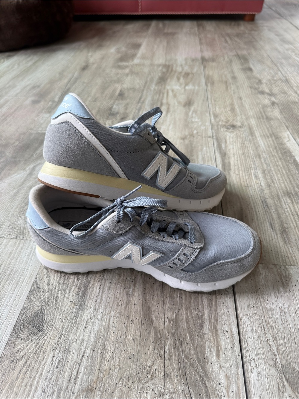 New Balance Light Gray Suede Sneakers with Pale Yellow and Light Blue Accents